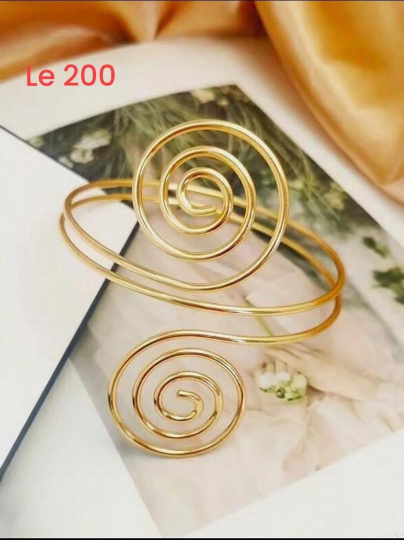 GOLDEN SPIRAL ARMLET - Trillingo Express Online Marketplace
